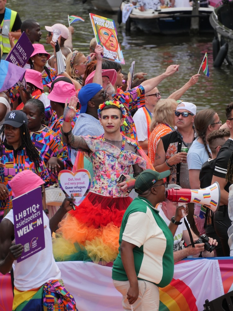 Colourful man celebrates pride.